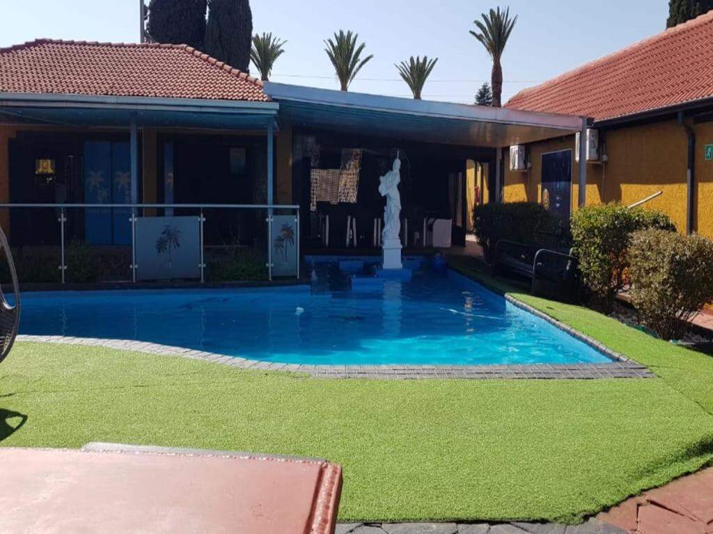 Pool and garden at National Lodge